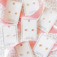 LINNY CO Alli Pink screwback stud earrings for kids & little girls — hypoallergenic, waterproof stainless steel with secure screwback backs, flat-lay styling.