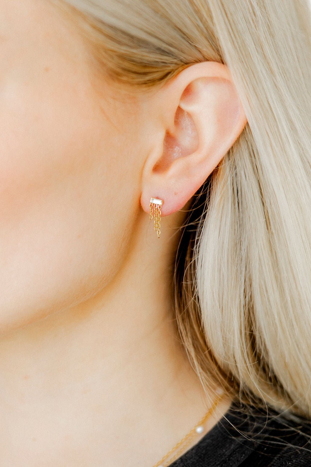 LINNY CO Becca screwback stud earrings for kids & little girls — hypoallergenic, waterproof stainless steel with secure screwback backs, shown on model.