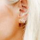 LINNY CO Becca screwback stud earrings for kids & little girls — hypoallergenic, waterproof stainless steel with secure screwback backs, shown on model.