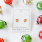 LINNY CO Chandler Ornament screwback stud earrings for kids & little girls — hypoallergenic, waterproof stainless steel with secure screwback backs, flat-lay styling.