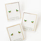 LINNY CO Holly Berry screwback stud earrings for kids & little girls — hypoallergenic, waterproof stainless steel with secure screwback backs, flat-lay styling.