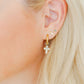 LINNY CO Kate Candy Gold screwback stud earrings for kids & little girls — hypoallergenic, waterproof stainless steel with secure screwback backs, shown on model.