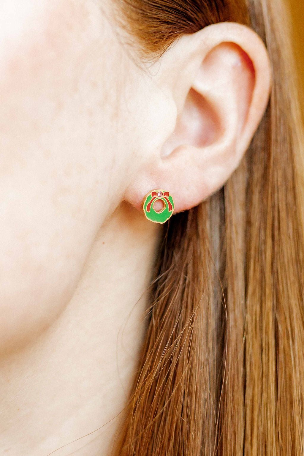 LINNY CO Leighton Wreath screwback stud earrings for kids & little girls — hypoallergenic, waterproof stainless steel with secure screwback backs, shown on model.