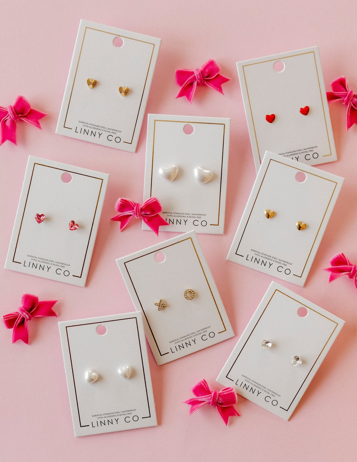 LINNY CO Lucia Large screwback stud earrings for kids & little girls — hypoallergenic, waterproof stainless steel with secure screwback backs, flat-lay styling.