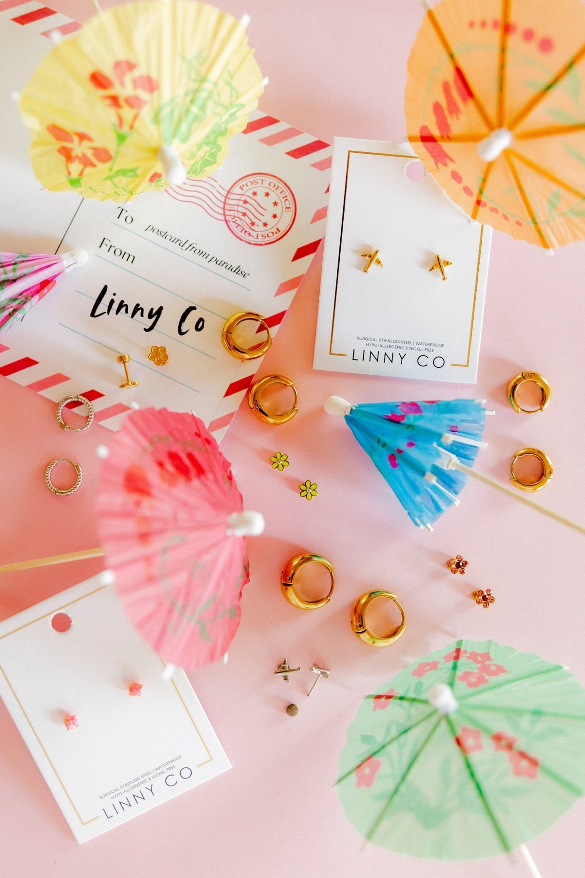 LINNY CO Lyla Flower Pink screwback stud earrings for kids & little girls — hypoallergenic, waterproof stainless steel with secure screwback backs, shown on model.