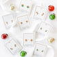 LINNY CO Merritt Ornament screwback stud earrings for kids & little girls — hypoallergenic, waterproof stainless steel with secure screwback backs, flat-lay styling.