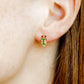 LINNY CO Merritt Ornament screwback stud earrings for kids & little girls — hypoallergenic, waterproof stainless steel with secure screwback backs, shown on model.