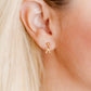 LINNY CO Millie Bow screwback stud earrings for kids & little girls — hypoallergenic, waterproof stainless steel with secure screwback backs, shown on model.