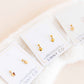LINNY CO Millie Heart Gold screwback stud earrings for kids & little girls — hypoallergenic, waterproof stainless steel with secure screwback backs, flat-lay styling.