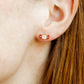 LINNY CO Taffy screwback stud earrings for kids & little girls — hypoallergenic, waterproof stainless steel with secure screwback backs, shown on model.